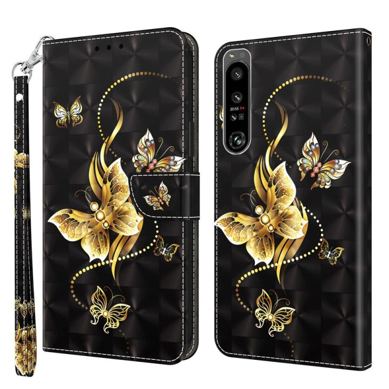 Flip Case Sony Xperia 1 IV Suojaketju Kuori Kultaiset Perhoset Hihnalla